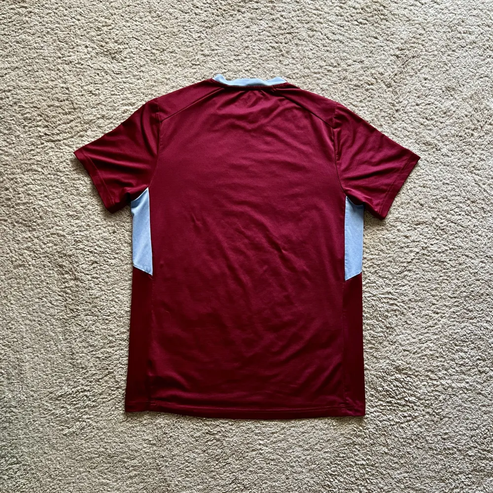 Rear view of Aston Villa 2023/24 Castore 1 Pre Match Shirt - Men's Medium