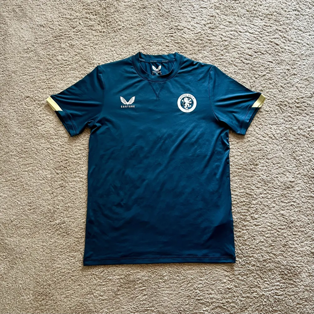 Front view of Aston Villa 2023/24 Castore 1 Travel Shirt - Men's Medium