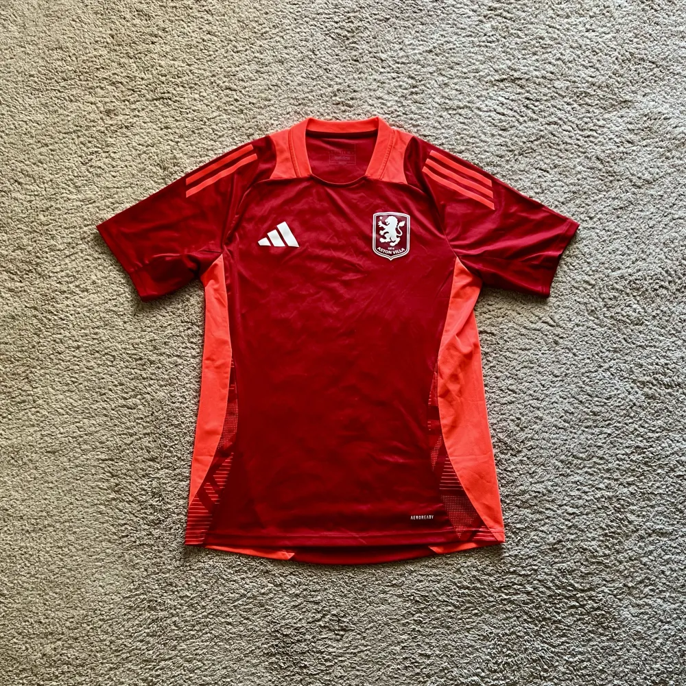 Front view of Aston Villa 2024/25 Adidas 4 Training Shirt - Men's Medium