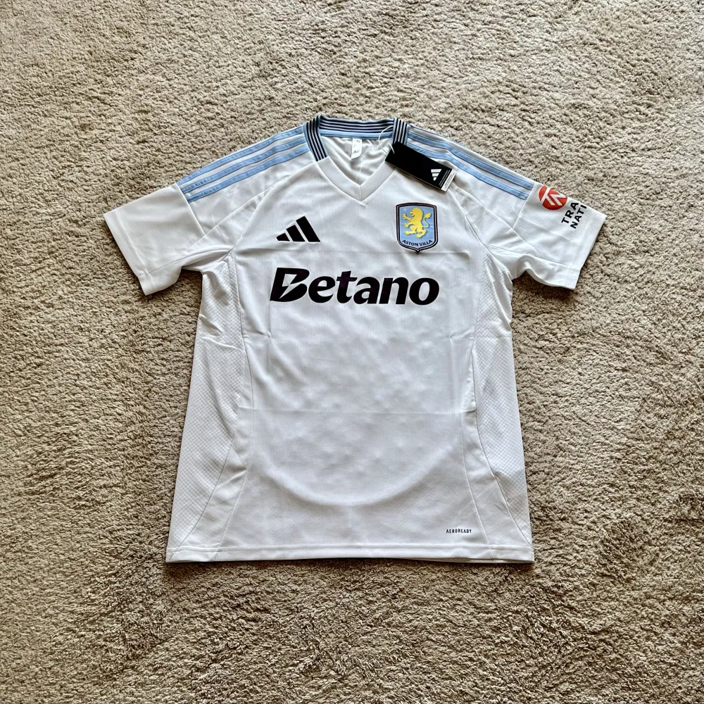 Front view of Aston Villa 2024/25 Adidas Away Shirt (Betano) - Men's Medium