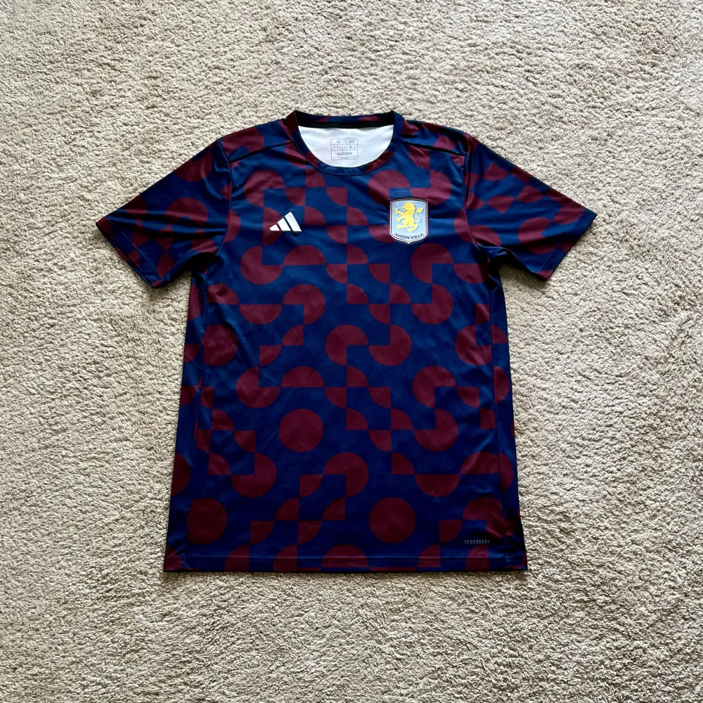 Front view of Aston Villa 2024/25 Adidas 1 Pre Match Shirt - Men's Medium